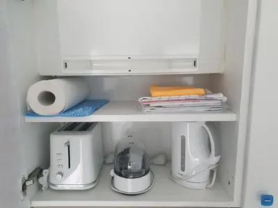 Kaffee-/Teezubehör in der Unterkunft Apartment 103 im Haus Seehütte direkt am Strand in Cuxhaven Duhnen mit Seesicht in der Ferne
