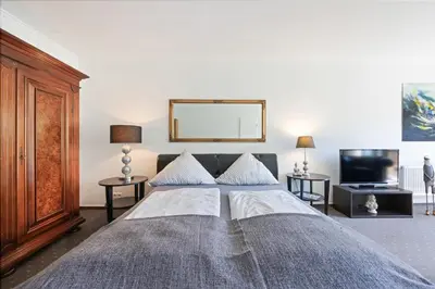 Ein Bett oder Betten in einem Zimmer der Unterkunft Sandkorn-Büsum