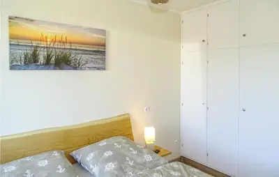 Ein Bett oder Betten in einem Zimmer der Unterkunft Lovely Apartment In Büsum With Kitchen
