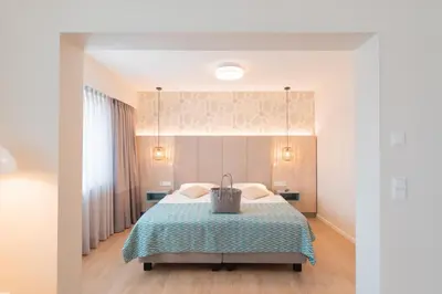 Ein Bett oder Betten in einem Zimmer der Unterkunft Hotel Strandhus