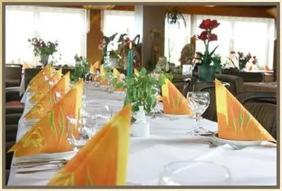 Ein Restaurant oder anderes Speiselokal in der Unterkunft Seehotel Geestland