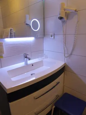 Ein Badezimmer in der Unterkunft Seehotel Geestland