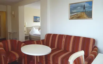 Ein Sitzbereich in der Unterkunft Seehotel Neue Liebe