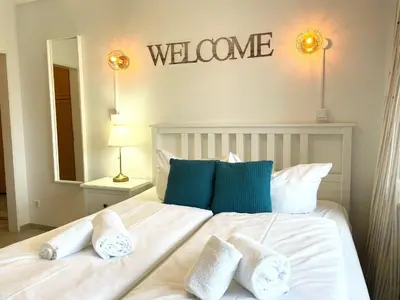 Ein Bett oder Betten in einem Zimmer der Unterkunft Haus Frauenpreiss FeWo 404