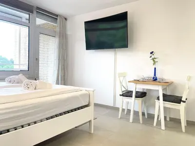 Ein Bett oder Betten in einem Zimmer der Unterkunft Haus Frauenpreiss FeWo 404