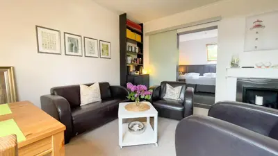 Ein Sitzbereich in der Unterkunft Moderne Ferienwohnung für 4 Personen in Duhnen