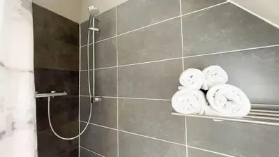 Ein Badezimmer in der Unterkunft Moderne Ferienwohnung für 4 Personen in Duhnen
