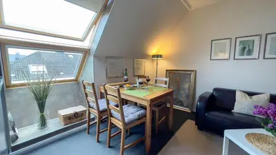 Ein Sitzbereich in der Unterkunft Moderne Ferienwohnung für 4 Personen in Duhnen