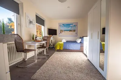 Ein Bett oder Betten in einem Zimmer der Unterkunft Studio-Apartment Nr. 59 im strandnahen Haus Frauenpreiss