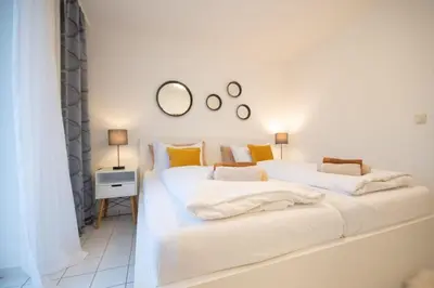 Ein Bett oder Betten in einem Zimmer der Unterkunft Marina View