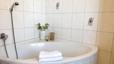 Ein Badezimmer in der Unterkunft Haus Eversand 2