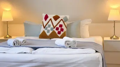 Ein Bett oder Betten in einem Zimmer der Unterkunft Haus Eversand 2