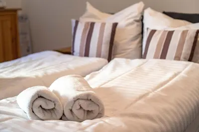 Ein Bett oder Betten in einem Zimmer der Unterkunft Neue Reihe 8 rechts