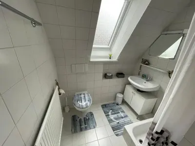 Ein Badezimmer in der Unterkunft Lust auf Meer - Ferienwohnung für 4 Personen kleine Hunde willkommen Nähe Nordsee