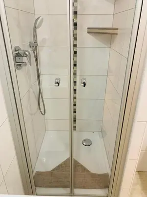 Ein Badezimmer in der Unterkunft Duhnentraum Balkon mit Meerblick & Top Lage, Parken, Wlan, Bettwäsche inklusive