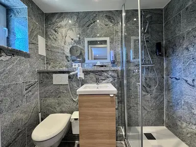 Ein Badezimmer in der Unterkunft Mertinkus Nordseehotel