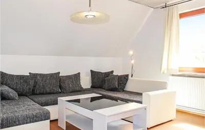 Ein Sitzbereich in der Unterkunft Cozy Apartment In Wurster Nordseeküste