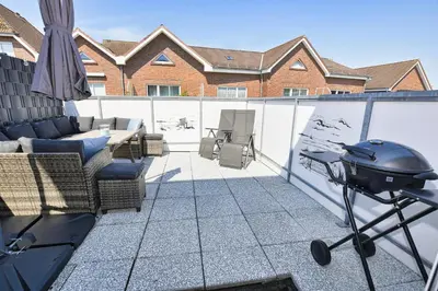 Ein Balkon oder eine Terrasse in der Unterkunft Ferienwohnung NORDIA Mitte