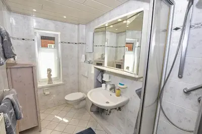 Ein Badezimmer in der Unterkunft Ferienwohnung NORDIA Mitte
