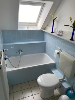 Ein Badezimmer in der Unterkunft Haus Windjammer