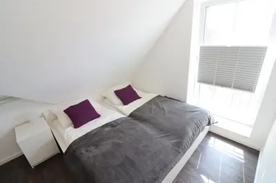 Ein Bett oder Betten in einem Zimmer der Unterkunft Ferienhaus im Angerdorf
