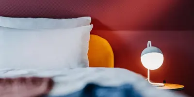 Ein Bett oder Betten in einem Zimmer der Unterkunft Boutique-Hotel Zur alten Post - Stammhaus