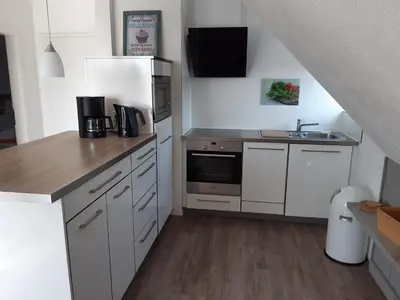 Küche/Küchenzeile in der Unterkunft dat geele hus 2