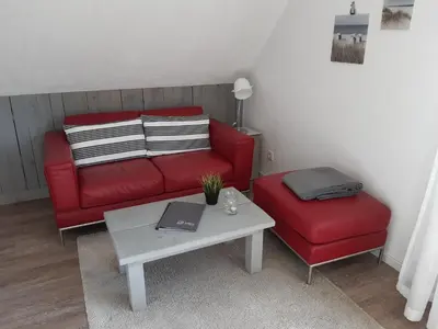 Ein Sitzbereich in der Unterkunft dat geele hus 2