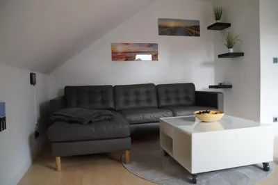 Ein Sitzbereich in der Unterkunft Ferienwohnung Robbe