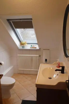 Ein Badezimmer in der Unterkunft Ferienwohnung Robbe