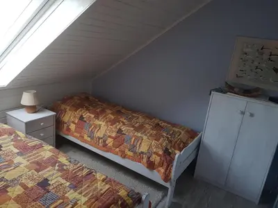Ein Bett oder Betten in einem Zimmer der Unterkunft Ferienwohnung 2 - Leopold