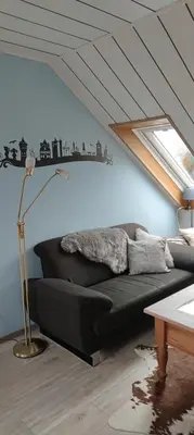 Ein Sitzbereich in der Unterkunft Ferienwohnung 2 - Leopold