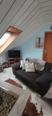 Ein Sitzbereich in der Unterkunft Ferienwohnung 2 - Leopold