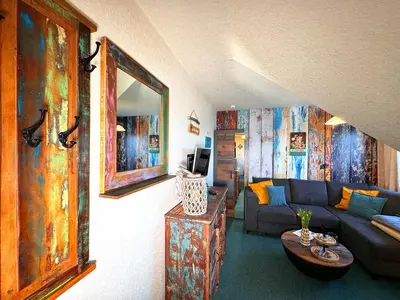 TV/Unterhaltungsangebot in der Unterkunft Hawaii - by Mila FerienARPartments - Büsum Zentrum eigener Parkplatz
