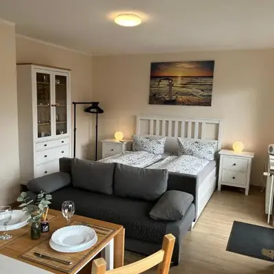 Ferienwohnung Ritthoff Perlebucht - mit Strandkorb am Meer und kostenloser Eintritt ins Schwimmbad