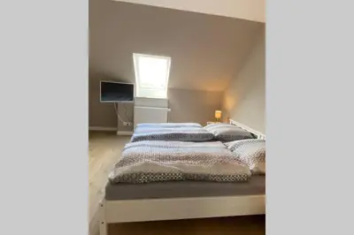 Ein Bett oder Betten in einem Zimmer der Unterkunft Ferienwohnung Zwischen Eider u. Elbe