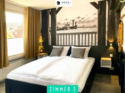 Ein Bett oder Betten in einem Zimmer der Unterkunft Dock 6 - Cuxhaven