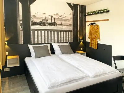 Ein Bett oder Betten in einem Zimmer der Unterkunft Dock 6 - Cuxhaven