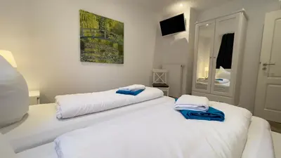 Ein Bett oder Betten in einem Zimmer der Unterkunft Haus Wattn Traum Whg 1 - Wunderschöne luxuriöse Ferienwohnung für bis zu 6 Personen