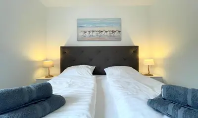 Ein Bett oder Betten in einem Zimmer der Unterkunft Seequartier 1