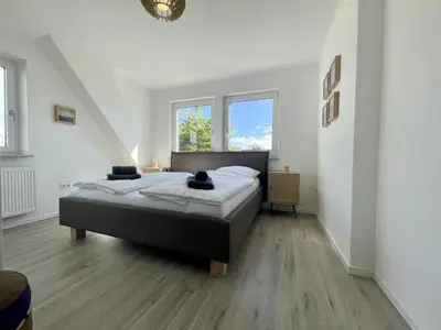 Ein Bett oder Betten in einem Zimmer der Unterkunft Seequartier 4