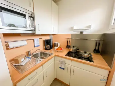 Küche/Küchenzeile in der Unterkunft Strandappartement 15 Haus Kehrwieder