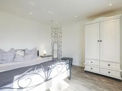 Ein Bett oder Betten in einem Zimmer der Unterkunft Holiday Home Sonnenschein by Interhome
