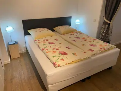 Ein Bett oder Betten in einem Zimmer der Unterkunft Büsumer Seeblick