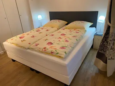 Ein Bett oder Betten in einem Zimmer der Unterkunft Büsumer Seeblick