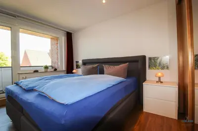Ein Bett oder Betten in einem Zimmer der Unterkunft Ferienwohnung 34 Heinrich-Grube-Weg