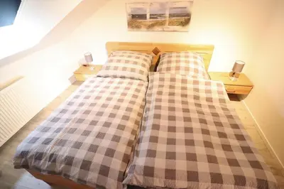 Ein Bett oder Betten in einem Zimmer der Unterkunft Inge 3