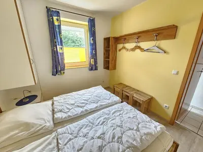 Ein Bett oder Betten in einem Zimmer der Unterkunft Nordheimstraße 150 Wohnung 2