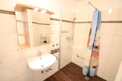 Ein Badezimmer in der Unterkunft Nordseebrandung B6.1