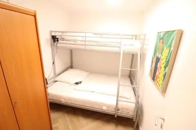 Ein Bett oder Betten in einem Zimmer der Unterkunft Nordseebrandung D5.2